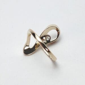 Gold ring with unique twisted design.