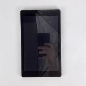Tablet with reflection of hand holding phone.