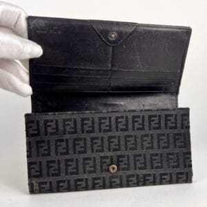 Black designer wallet with F pattern.