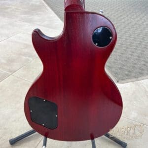 Back view of a red electric guitar.
