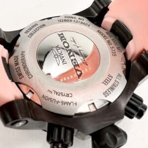 Watch back with Venom branding and details.