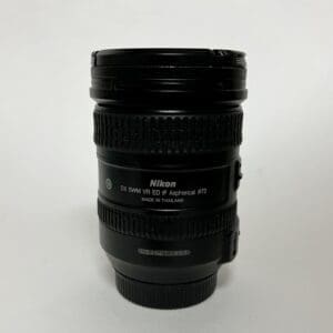 Nikon camera lens on white background.