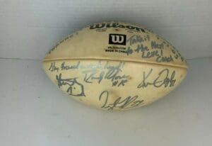Autographed Wilson football with handwritten messages.