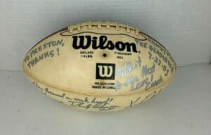 Autographed Wilson football with handwritten messages.