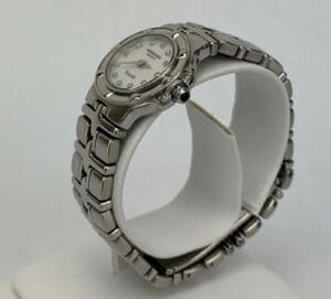 Silver wristwatch with metal bracelet displayed.