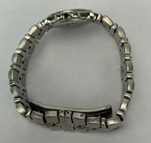 Silver wristwatch with metal link bracelet.