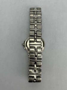 Metal watch with link bracelet, vertical view.