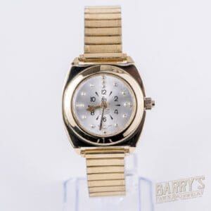 Gold wristwatch with a silver dial.