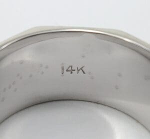 14K engraved on silver ring interior.