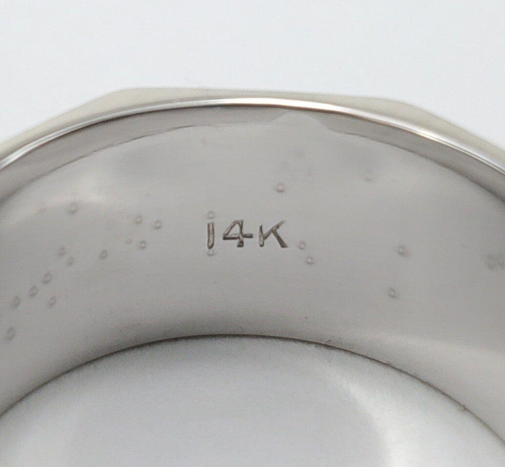 14K engraved on silver ring interior.