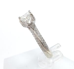 Diamond ring with detailed band setting.