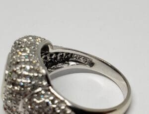 Silver ring with 14K engraving and diamonds.