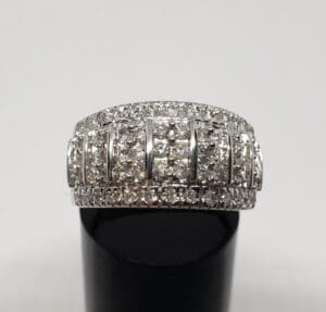 Diamond ring with intricate, sparkling design.