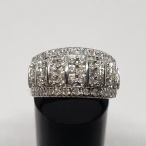 Diamond ring with intricate, sparkling design.