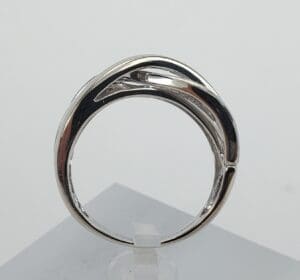 Silver ring with unique twisted design.