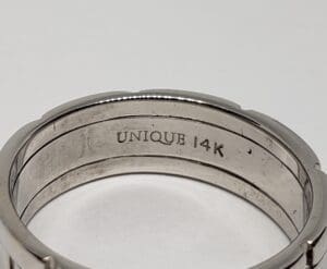 14K unique silver ring close-up view.
