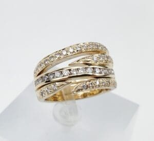 Gold ring with sparkling diamond accents.