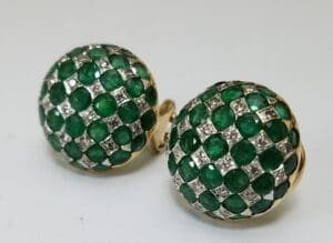 Green and silver checkered round earrings.