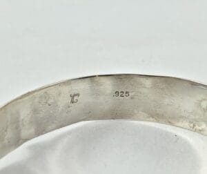 Silver bracelet with .925 hallmark stamp.