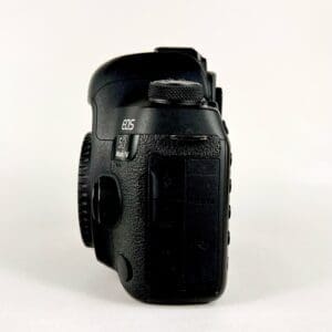 Side view of a DSLR camera body.
