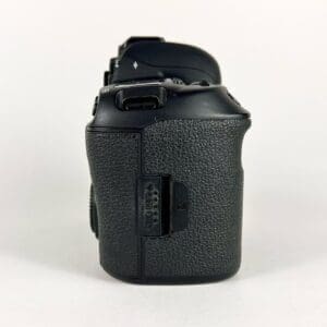 Side view of a DSLR camera.