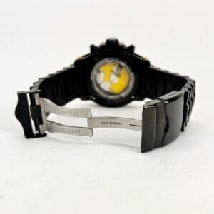 Black Invicta watch with stainless steel clasp.