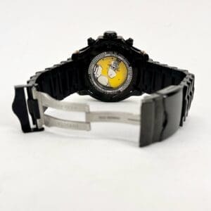 Black watch with yellow cartoon design.