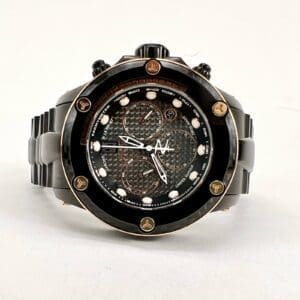 Luxury black wristwatch with intricate dial design.