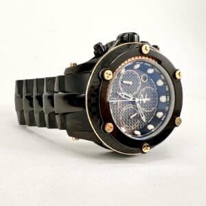 Black wristwatch with intricate dial design.