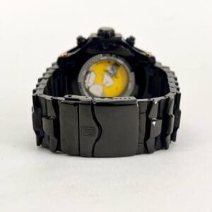 Black wristwatch with visible internal mechanism.