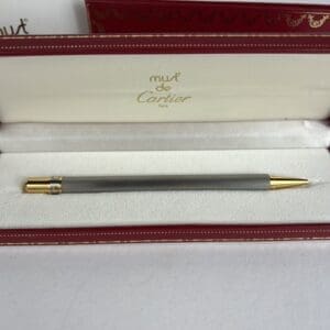 Luxury Cartier pen in red box.