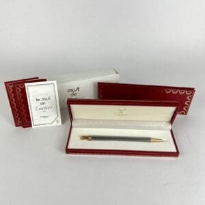 Cartier pen in red presentation box.