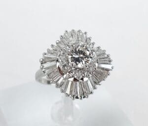 Diamond ring with intricate baguette setting.