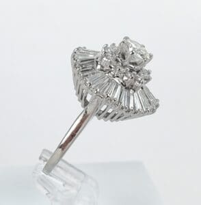 Diamond ring with intricate baguette setting.