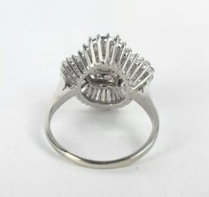 Silver ring with intricate band design.