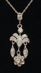 Elegant diamond pendant with intricate design.