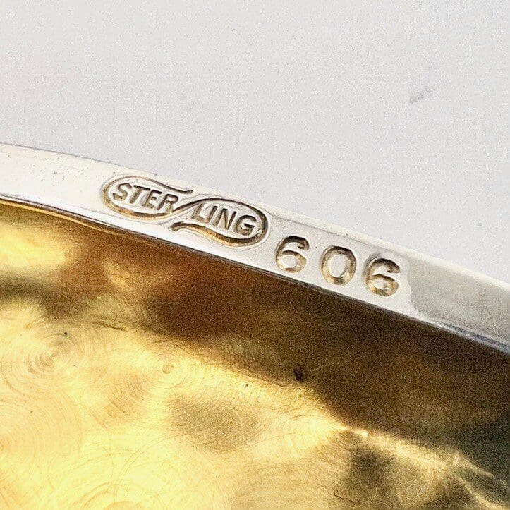 Sterling silver mark with number 606.