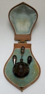 Jewelry piece in an open case.