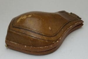 Brown vintage leather glasses case, closed.