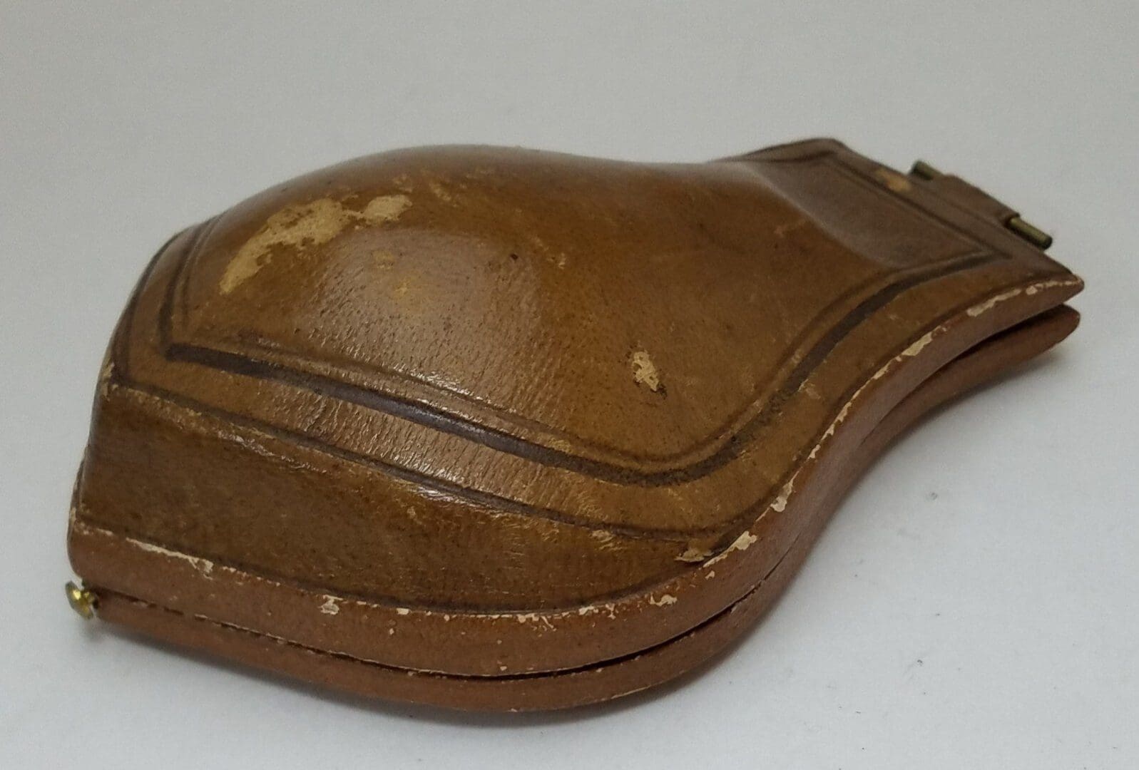 Brown vintage leather glasses case, closed.