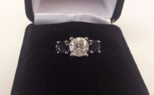 Diamond ring in black velvet box.