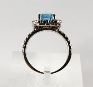 Silver ring with a blue gemstone.