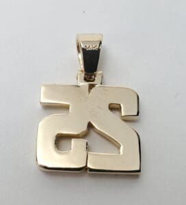 Gold pendant with engraved letters "25".