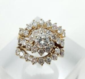 Gold ring with large central diamond.