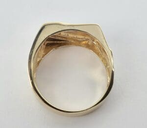 Gold ring with a geometric design.