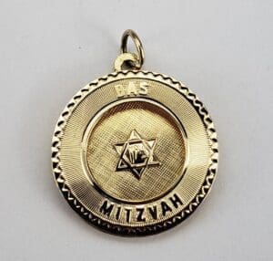 Gold Bas Mitzvah pendant with Star of David.