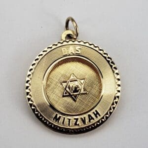Gold Bas Mitzvah pendant with Star of David.