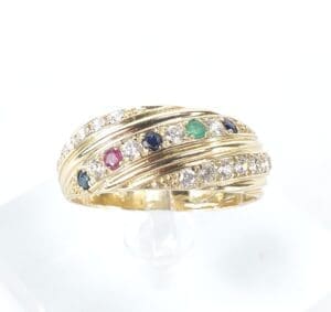 Gold ring with multicolored gemstones and diamonds.