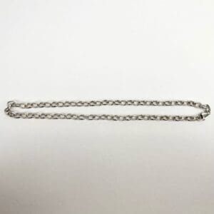 Silver chain on white background.