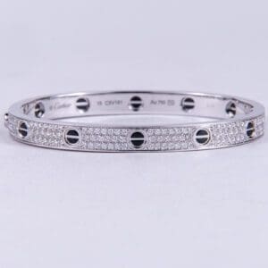 Silver bracelet with diamond accents.